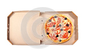 Open cardboard box with delicious pizza on white background, top view.