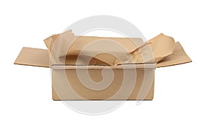 Open cardboard rectangular box made of corrugated brown paper isolated on a white background