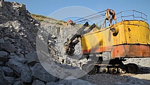 Open cast mine. Mining industry. Stone Quarrying. Quarry for the extraction of granite. Extraction of granite.