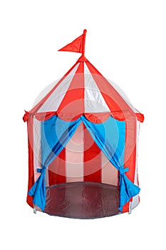 Open children white and red striped circus tent with flag on top for kids games isolated on white background
