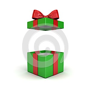 Open christmas gift box or green present box with red ribbon bow isolated on white background