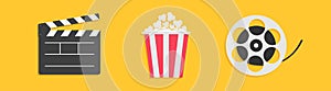 Open clapper board. Movie reel Popcorn box. Cinema icon set line. Flat design style. Yellow background. Isolated