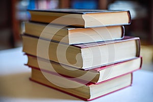 Open and closed books on a table