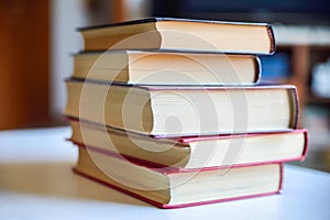 Open and closed books on a table
