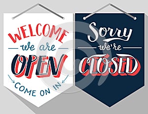 Open and closed hand lettered signs