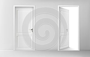 Open and closed white wooden doors