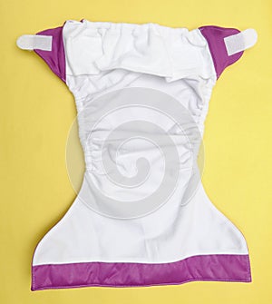 Open Cloth Diaper on Yellow Background