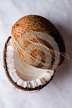 Open coconut on white