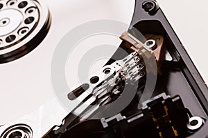 Open computer hard drive disc on white