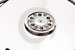 Open computer hard drive disc on white