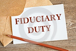 Open craft envelope and card with the words Fiduciary Duty