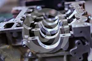 Open cylinder block of car engine, reparation, close-up