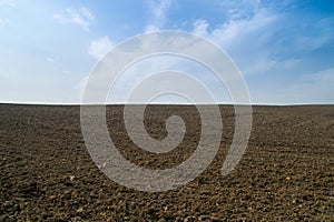 Open dirt farmland.