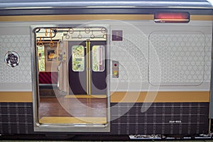 The open door of beautiful train at Nikko station, background