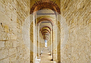 Open door in the end of the arched tunnel