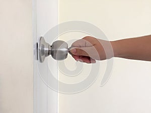 Open the door with a key.