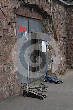 Open door to the garage of a tire workshop.