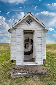 Open door to the tiny St. Johns Lutheran Church near Leader, SK, Canada