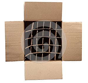 Open empty cardboard box with partitions for transporting broken items of bottles