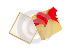 open empty luxury gold gift box with red ribbon bow isolated on white background