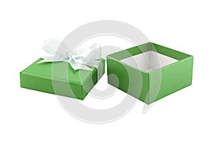 open and empty olive green color gift box with white ribbon bow tied on lid isolated on white background