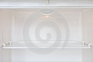 Open empty white refrigerator