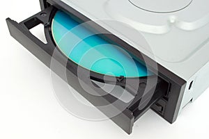 Open-ended CD - DVD drive with a black cap and disk inside.