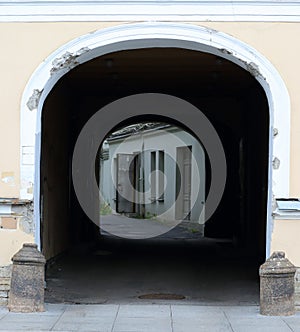 Open entrance to the arch leading to the courtyard