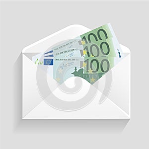 Open envelope and 100 euro bills cash