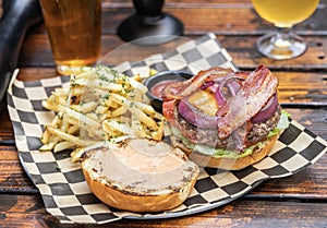 Open Faced Bacon Cheese Burger with Garlic Fries and Beer