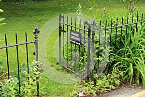 Open fence and a warning, private gardens no admittance.