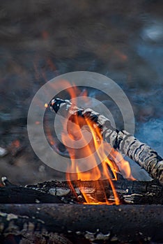 open fire burning in countryside home garden