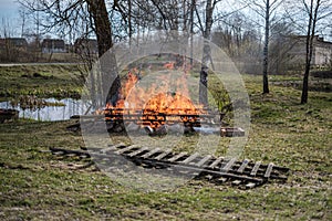 open fire burning in countryside home garden