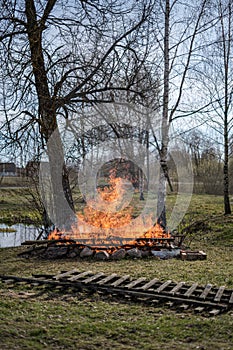 open fire burning in countryside home garden