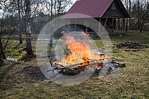 open fire burning in countryside home garden