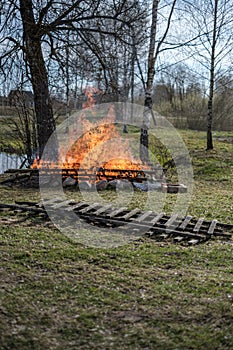 open fire burning in countryside home garden