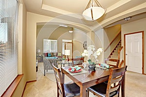 Open floor plan. Dining area and living room with entryway