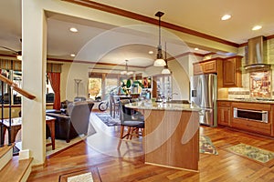 Open floor plan interior with living room, kitchen and dining area