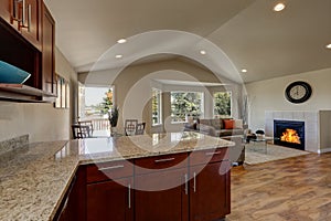 Open floor plan of kitchen, dining and living rooms