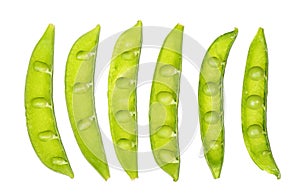 Open fresh peas isolated on white