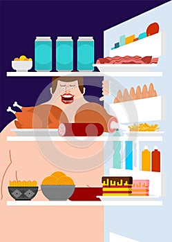 Open fridge and fat man Inside view. lot of food. Refrigerator f