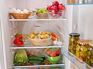Open fridge full of fresh fruits and vegetables, organic nutrition,