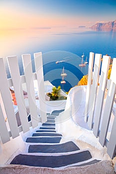 Open Gate to Paradise. Santorini, Greece. White architecture, open doors and steps to the blue sea of Santorini, Oia