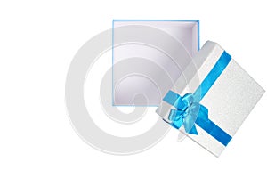 Open gift box with blue ribbon and bow white background
