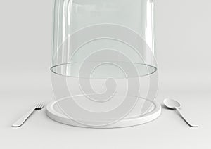 Open glass lid and tray with spoon and fork on white color photo