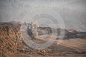 Open gold, diamonds, coal mine. Heavy machinery for mining quarries