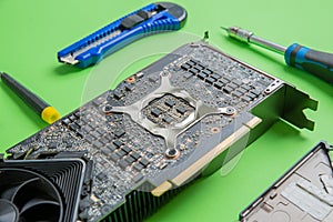 Open graphics card showing chips, MOSFETs, and power section