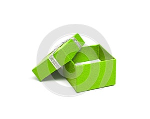 Open Green color gift box with silver ribbon on white b