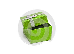 Open Green colour gift box with silver ribbon isolated on white