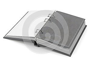 Open grey notebook with binding